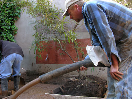 hose spraying concrete