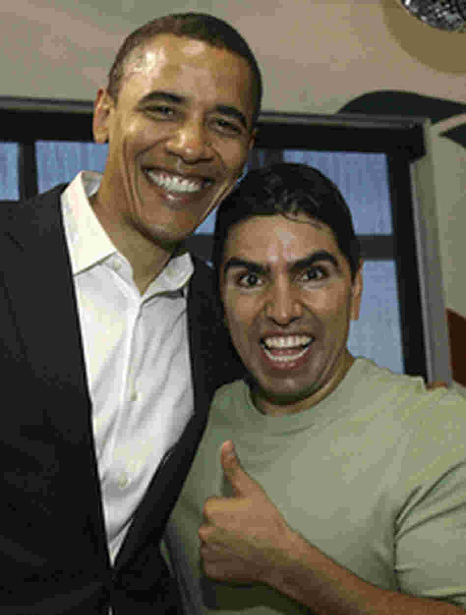 Then-presidential hopeful Barack Obama poses with radio host Eddie "Piolin" Sotelo following a cha Then-presidential hopeful Barack Obama poses with radio host Eddie "Piolin" Sotelo following a cha