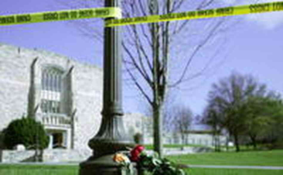 Pictured in 2007, Roses at the foot of a light post serve as a small memorial outside Norris Hall, Pictured in 2007, Roses at the foot of a light post serve as a small memorial outside Norris Hall,
