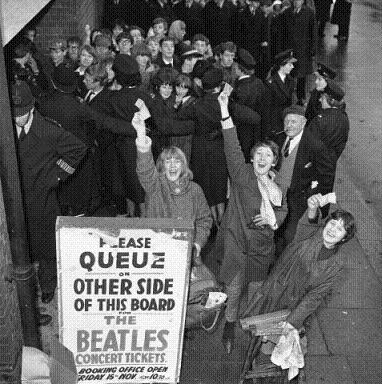 Fans exicted to snag a Beatles ticket.