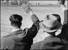 Men wave goodbye Men wave goodbye