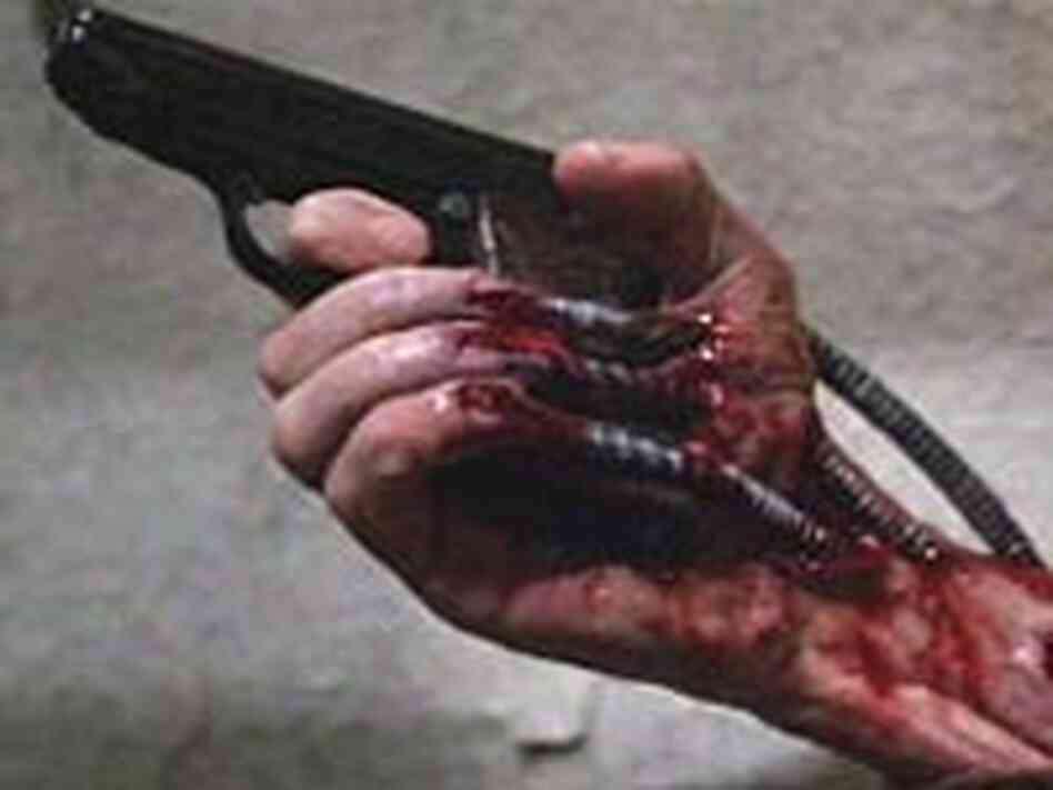 Hallucination or real horror? A gun from an unlikely source wraps itself around Max Renn's hand Hallucination or real horror? A gun from an unlikely source wraps itself around Max Renn's hand