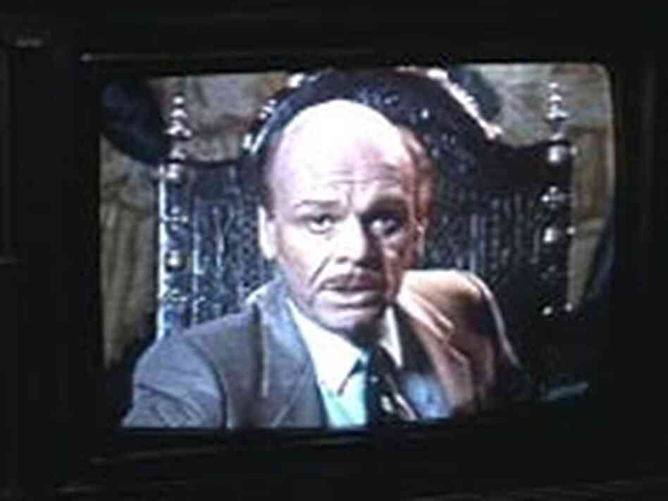 The shadowy Brian O'Blivion (Jack Creley) reveals the secrets of the Videodrome signal. The shadowy Brian O'Blivion (Jack Creley) reveals the secrets of the Videodrome signal.