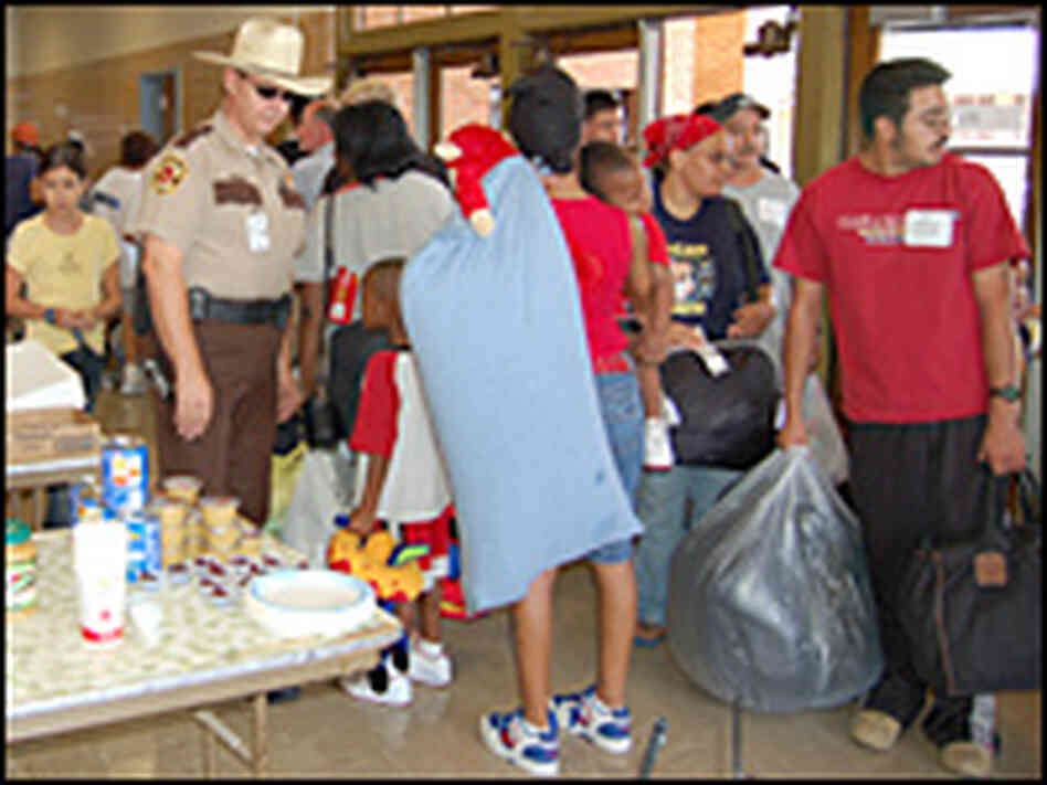 Evacuees arrive in an Austin, Texas shelter, Sept. 24.