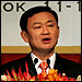 Thailand's Prime Minister Thaksin Shinawatra delivers his speech during 15th International Aids Conference in Bangkok, July 11, 2004. Credit: Reuters