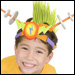Boy transforms into a mohawked-alien with Giggle Gear, a cap with mix-and-match parts.