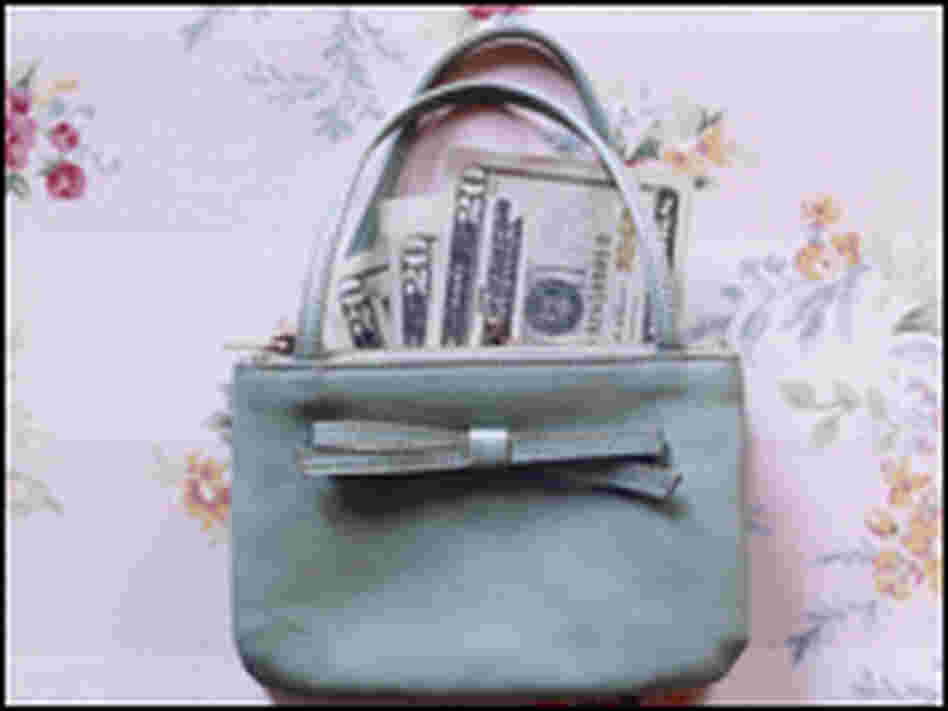 Purse with wads of cash Purse with wads of cash