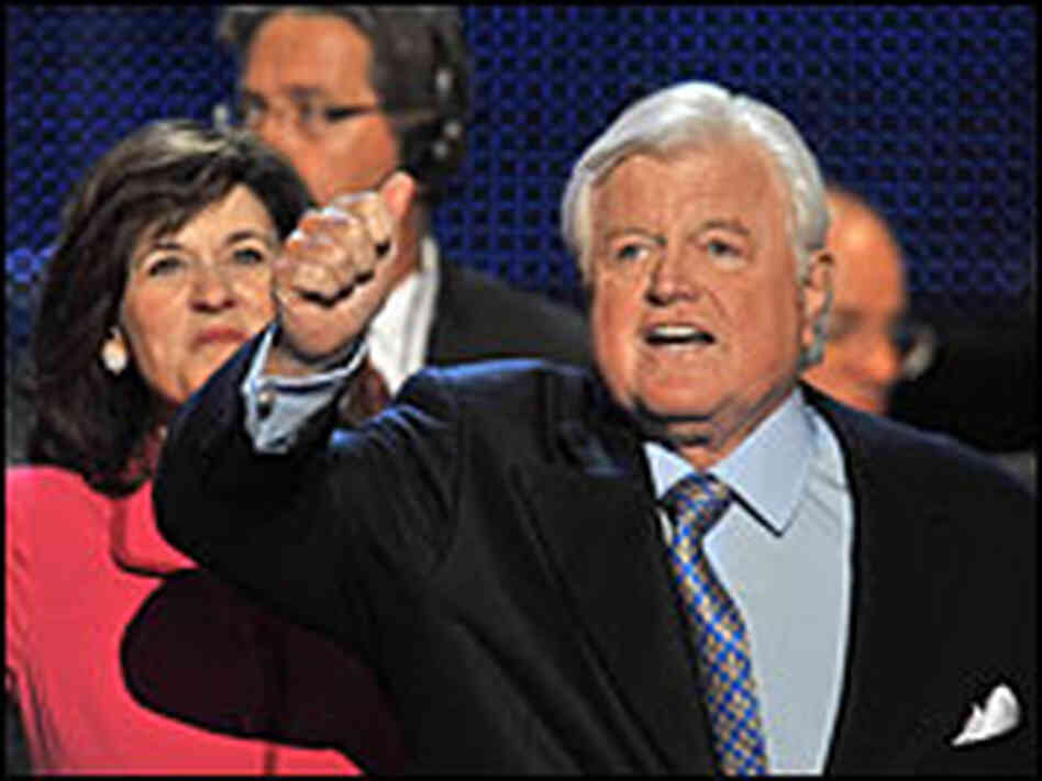 Sen. Edward Kennedy, flanked by his wife, Vicki, appeared robust in his unscheduled appearance.