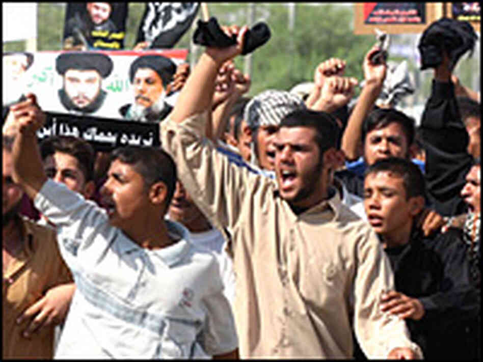 Supporters of radical Iraqi Shiite cleric Moqtada al-Sadr march in Basra, August 9, 2004. Supporters of radical Iraqi Shiite cleric Moqtada al-Sadr march in Basra, August 9, 2004.