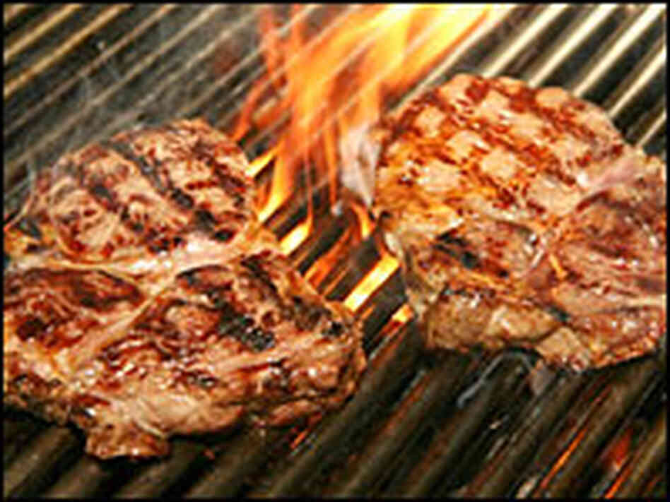 Steaks on a grill Steaks on a grill