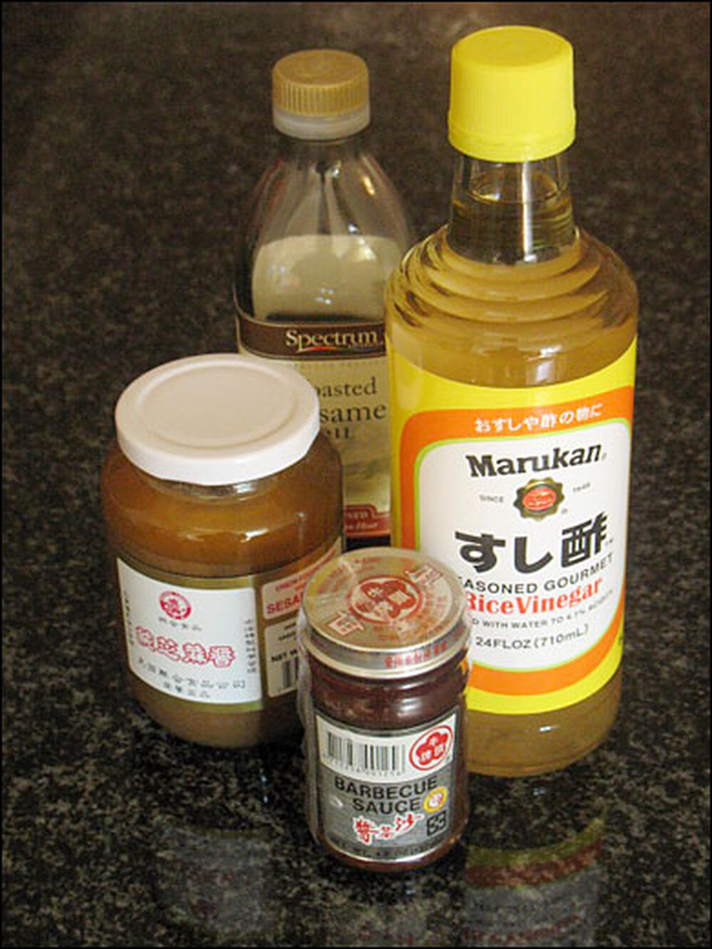 Sesame oil, soy sauce, rice vinegar and Chinese barbecue sauce