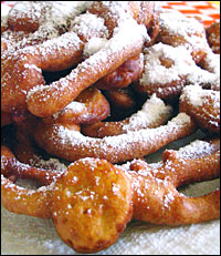 Funnel cakes — spirals of deep-fried batter sprinkled with powdered sugar — are the beloved fare of many a fair across the United States.