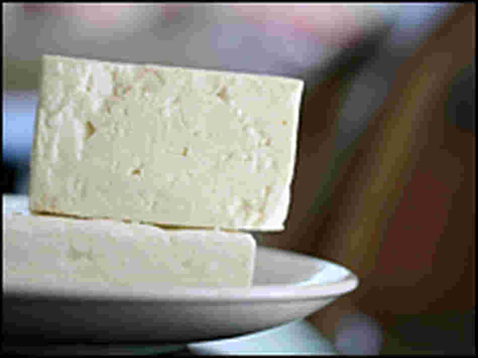 Feta is a brined, aged curd cheese.