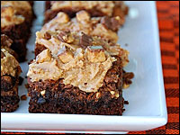 Raid the kiddies' trick-or-treat bags — or just go to the store — to find ingredients for grown-up goodies like Reese's Peanut Butter Cup Brownies.