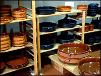 Cazuelas in many sizes and colors are on display at The Spanish Table in Berkeley, Calif.