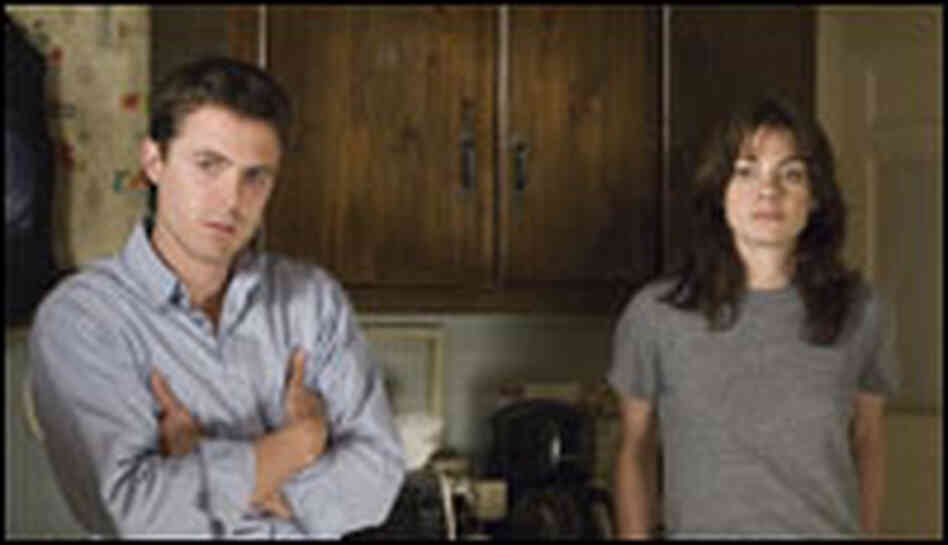 Casey Affleck as Patrick and Michelle Monaghan as Angie.