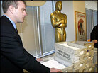 Pricewaterhouse Coopers staffers transport Oscar ballots in 2004. Pricewaterhouse Coopers staffers transport Oscar ballots in 2004.