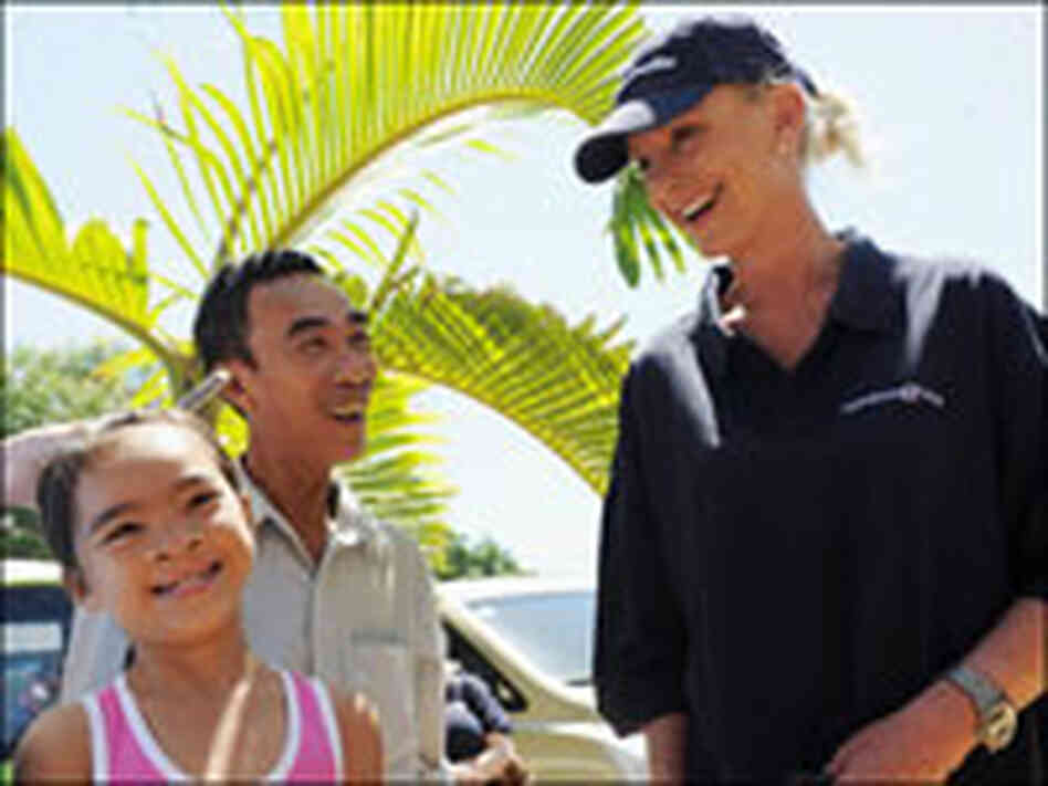 Cindy McCain meets with Le Thi Phuoc and her father, Le Van, at hospital in Vietnam in June.