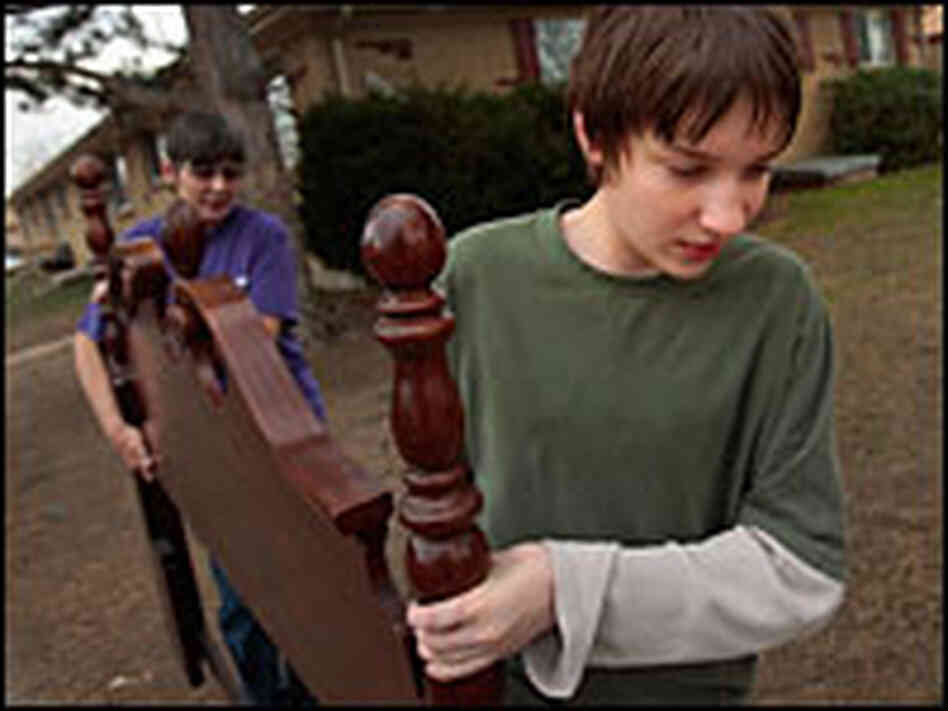 Damien DeNeir, 14, helps his grandmother Kim DeNeir move out of their Arvada, Colo., apartment. Damien DeNeir, 14, helps his grandmother Kim DeNeir move out of their Arvada, Colo., apartment.