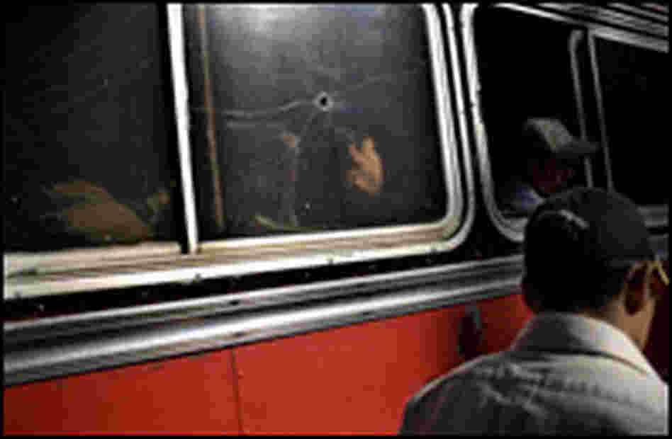 It is so common for buses to be attacked that owners often don't bother to repair them.
