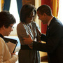 President Obama and first lady Michelle Obama share a moment in the Red Room of the White House along with adviser Valerie Jarrett and other staffers. "They had just a second together to say hi," says Shell, "and they have an amazing ability to tune the world out for just two seconds." President Obama and first lady Michelle Obama share a moment in the Red Room of the White House along with adviser Valerie Jarrett and other staffers. "They had just a second together to say hi," says Shell, "and they have an amazing ability to tune the world out for just two seconds."
