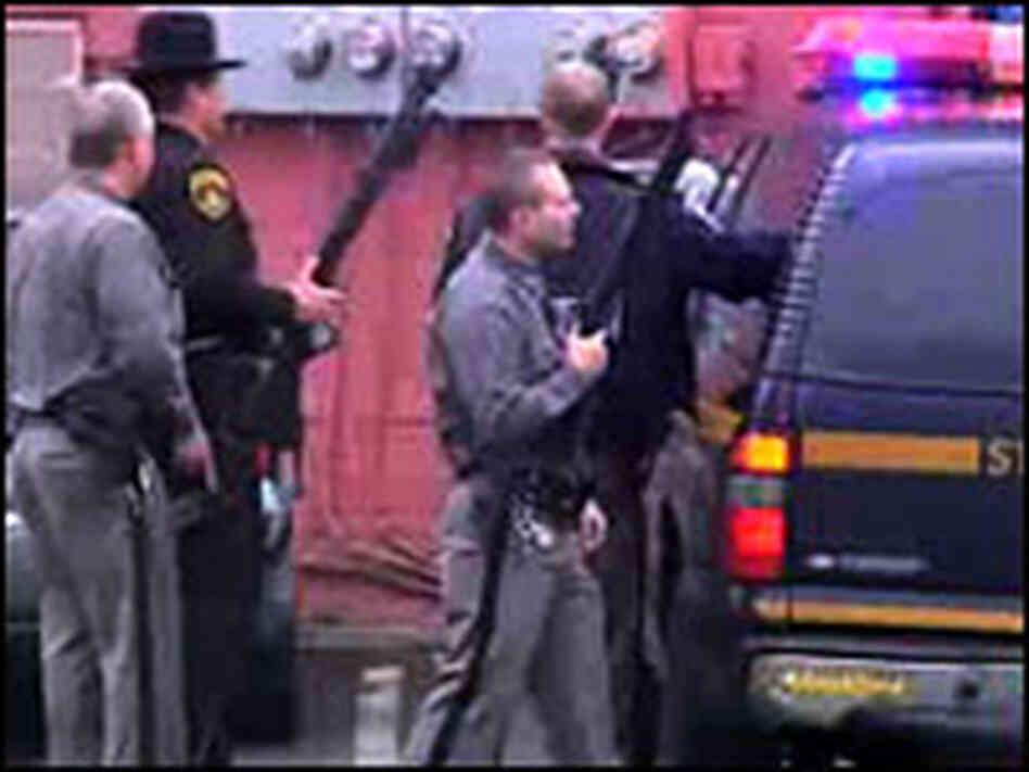Authorities outside the American Civic Association in Binghamton, N.Y., where a shooting took place Authorities outside the American Civic Association in Binghamton, N.Y., where a shooting took place