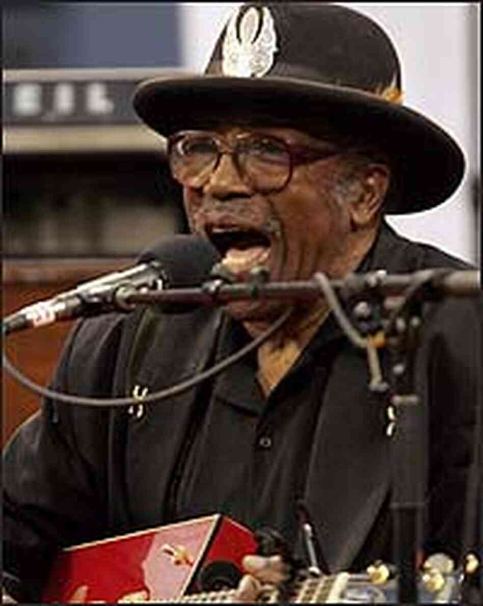Bo Diddley performs during the U.S. Open in Flushing Meadows, N.Y., in August, 2005.