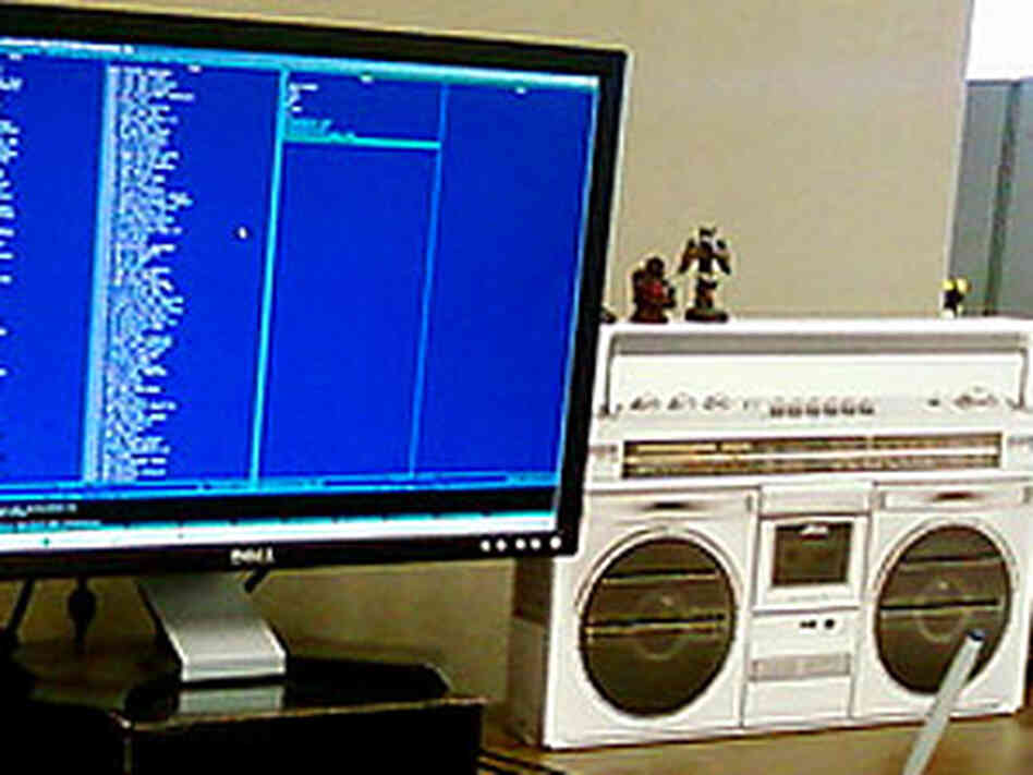 a boom box by a computer a boom box by a computer