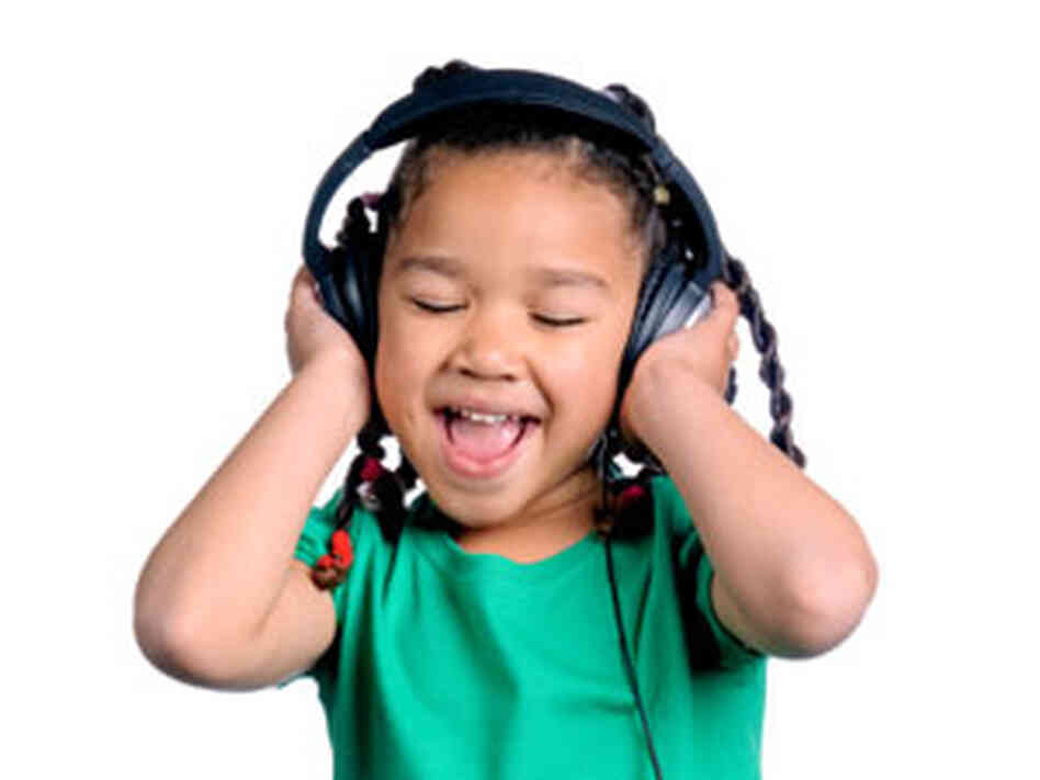 an adorable moppet wears headphones an adorable moppet wears headphones