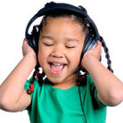 an adorable moppet wears headphones