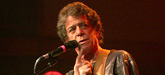 Lou Reed in concert; credit: Joel Didriksen of kingpinphoto.com, Getty Images