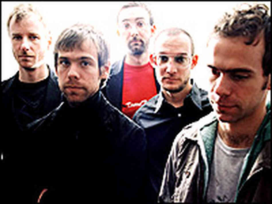 The National plays atmospheric, nuanced rock that can sound threatening, resigned, or both. The National plays atmospheric, nuanced rock that can sound threatening, resigned, or both.