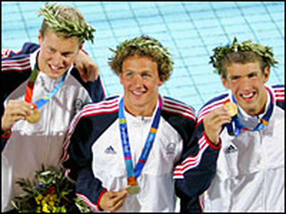 Michael Phelps, right, with Klete Keller after the four-man relay team won. Credit: Reuters Michael Phelps, right, with Klete Keller after the four-man relay team won. Credit: Reuters