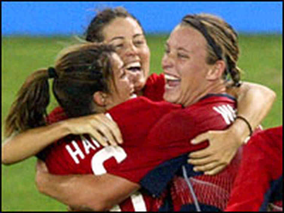 Teammates congratulate U.S. soccer player Lindsay Tarpley after she scored the first goal. Teammates congratulate U.S. soccer player Lindsay Tarpley after she scored the first goal.