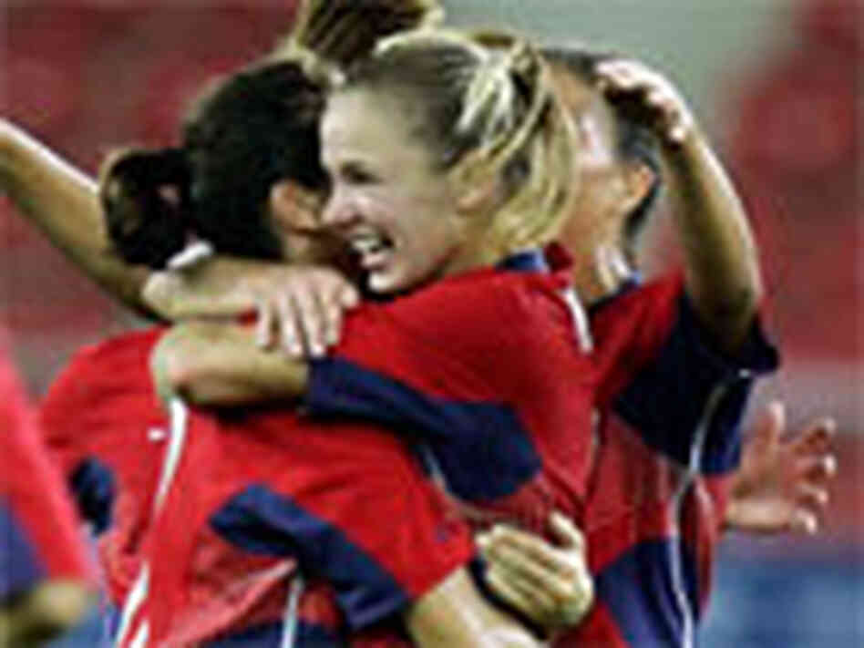 Teammates congratulate U.S. soccer player Lindsay Tarpley after she scored the first goal. Reuters Teammates congratulate U.S. soccer player Lindsay Tarpley after she scored the first goal. Reuters