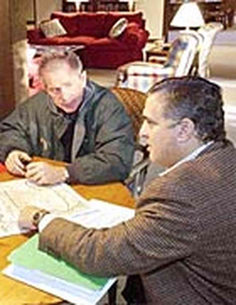 President Bush meets with George Tenet President Bush meets with George Tenet