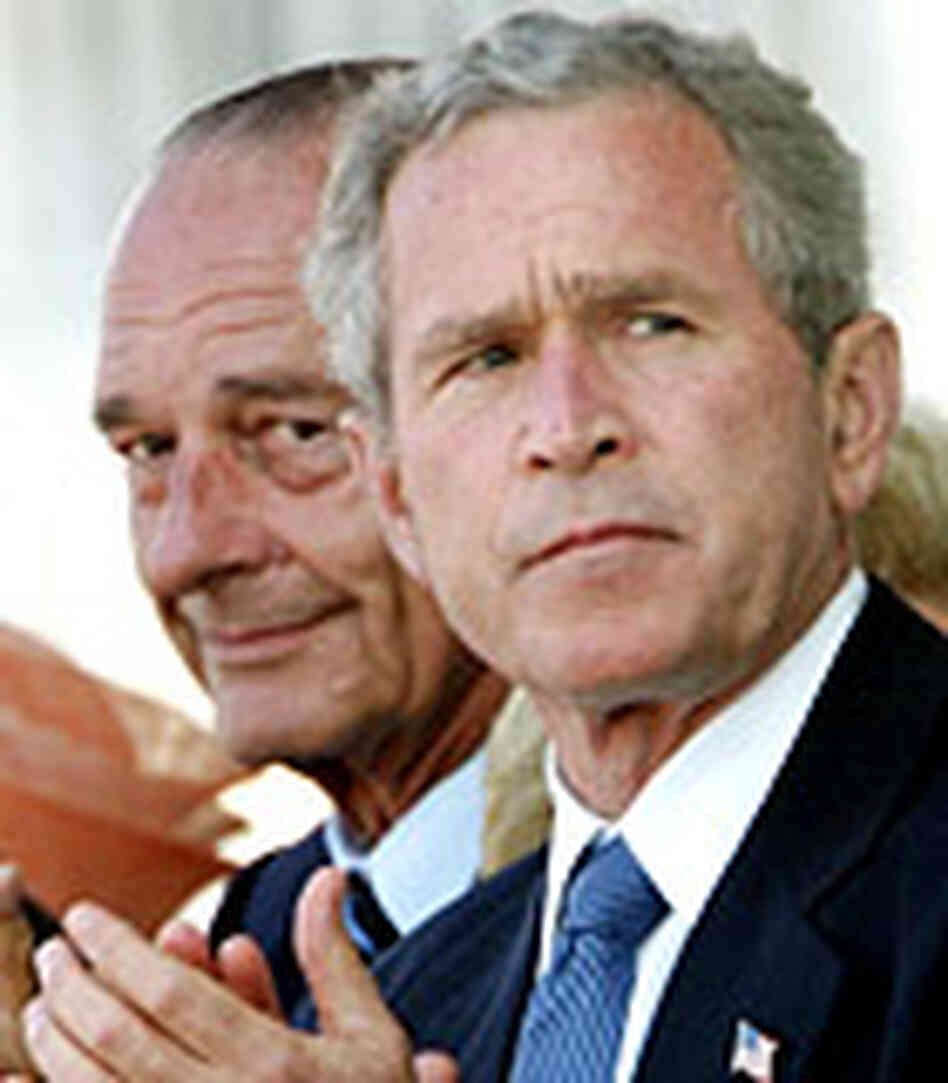 U.S. President George W. Bush (R) and French President Jacques Chirac attend ceremonies of the Inte U.S. President George W. Bush (R) and French President Jacques Chirac attend ceremonies of the Inte