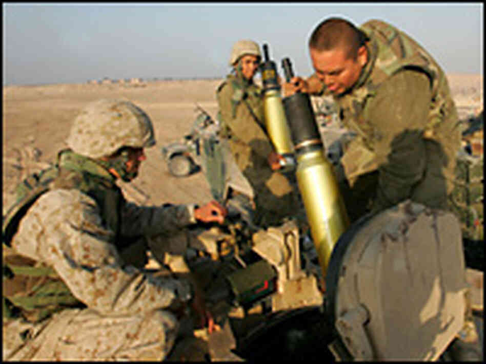 U.S. Marines reload their tanks with shells during battle in Fallujah, Nov. 10, 2004. U.S. Marines reload their tanks with shells during battle in Fallujah, Nov. 10, 2004.