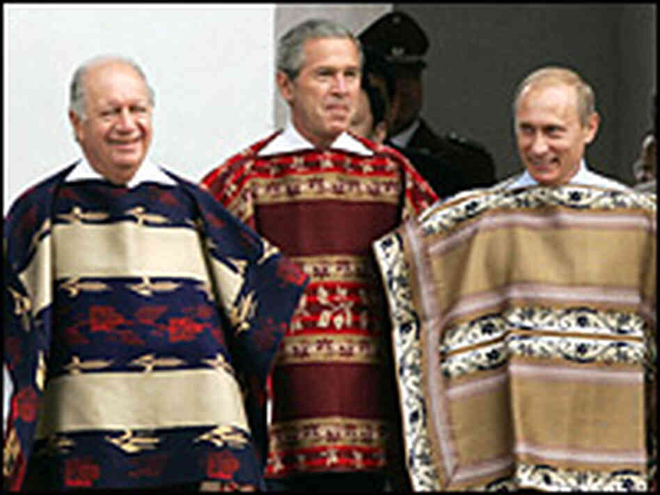 President Bush walks to an APEC photo with Presidents Ricardo Lagos and Vladimir Putin. Reuters President Bush walks to an APEC photo with Presidents Ricardo Lagos and Vladimir Putin. Reuters