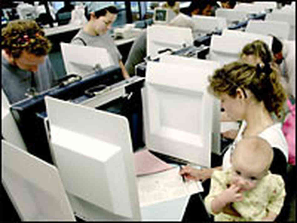 Voters cast their ballots early at the Supervisor of Elections Office for Orange County, Fla. Voters cast their ballots early at the Supervisor of Elections Office for Orange County, Fla.