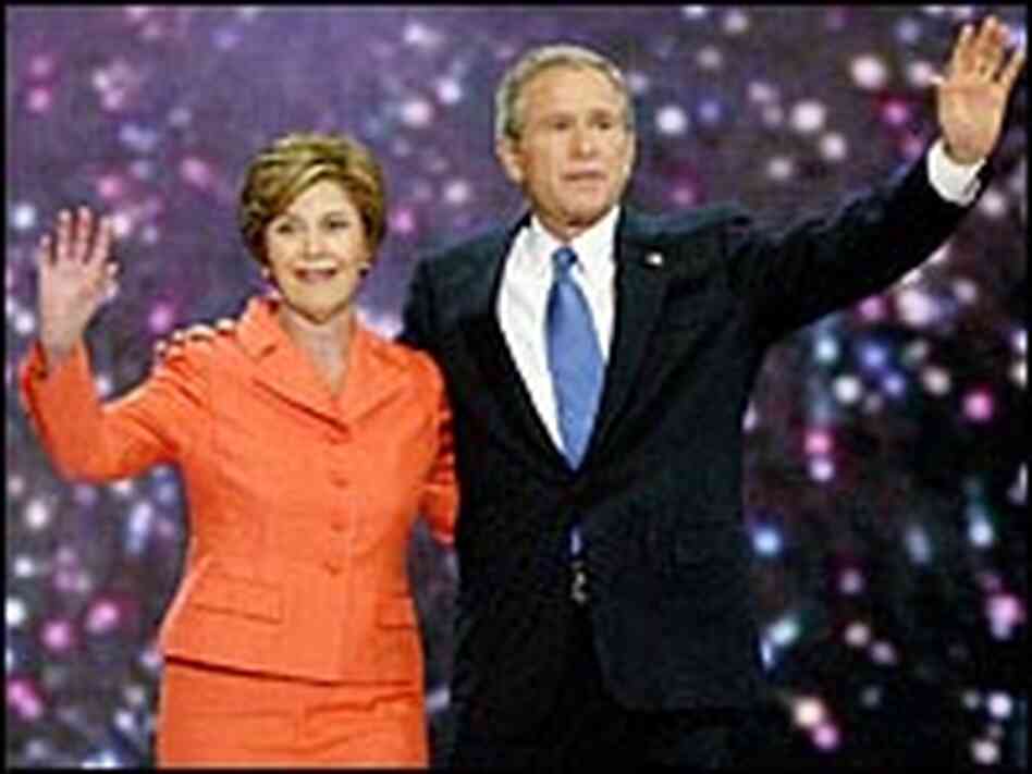 President George W. Bush, accompanied by first lady Laura Bush President George W. Bush, accompanied by first lady Laura Bush