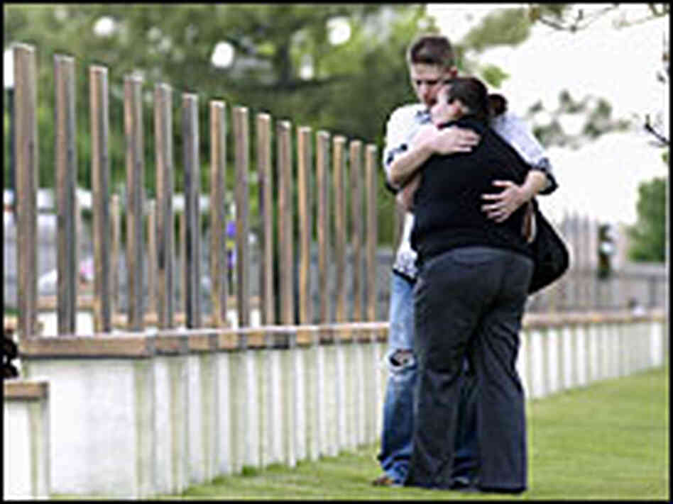 Rick and Farrah Luce embrace in front of their grandmother's memorial chair at the Oklahoma City Nat Rick and Farrah Luce embrace in front of their grandmother's memorial chair at the Oklahoma City Nat
