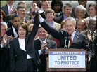 House Minority Leader Nancy Pelosi and Senate Minority Leader Harry Reid join hands at a rally. House Minority Leader Nancy Pelosi and Senate Minority Leader Harry Reid join hands at a rally.
