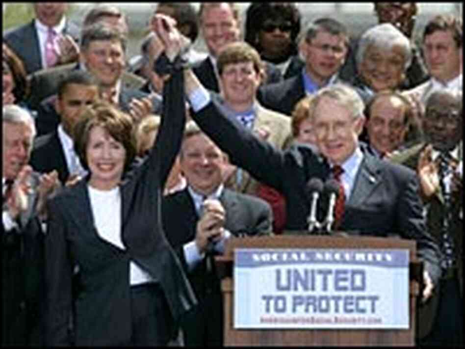 House Minority Leader Nancy Pelosi and Senate Minority Leader Harry Reid join hands at a rally. House Minority Leader Nancy Pelosi and Senate Minority Leader Harry Reid join hands at a rally.
