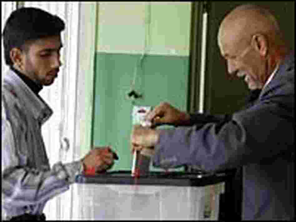 A man votes at a polling station in Baghdad, Dec. 15. A man votes at a polling station in Baghdad, Dec. 15.