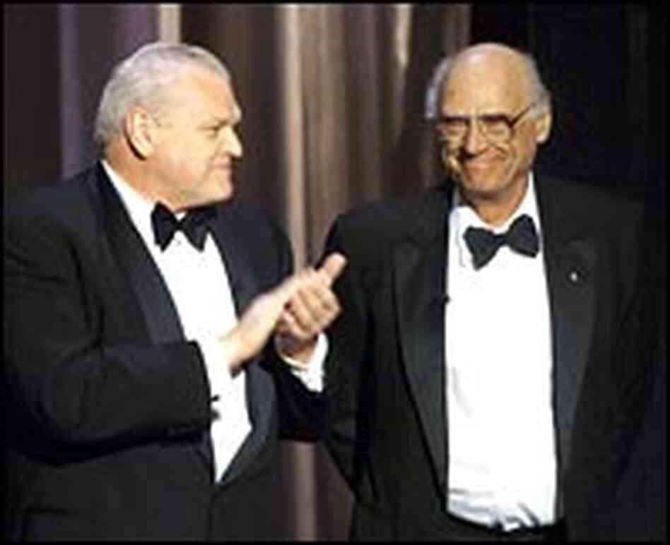 Arthur Miller, right, is applauded by actor Brian Dennehy. Arthur Miller, right, is applauded by actor Brian Dennehy.
