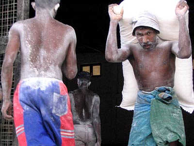 Workers load relief supplies into trucks in the Sri Lankan capital Colombo.