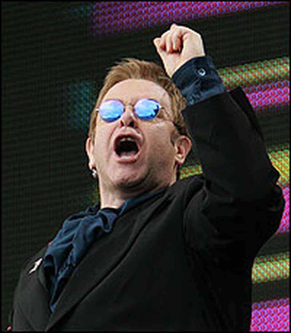 British rock star Elton John performs at the Live 8 concert in Hyde Park in London British rock star Elton John performs at the Live 8 concert in Hyde Park in London