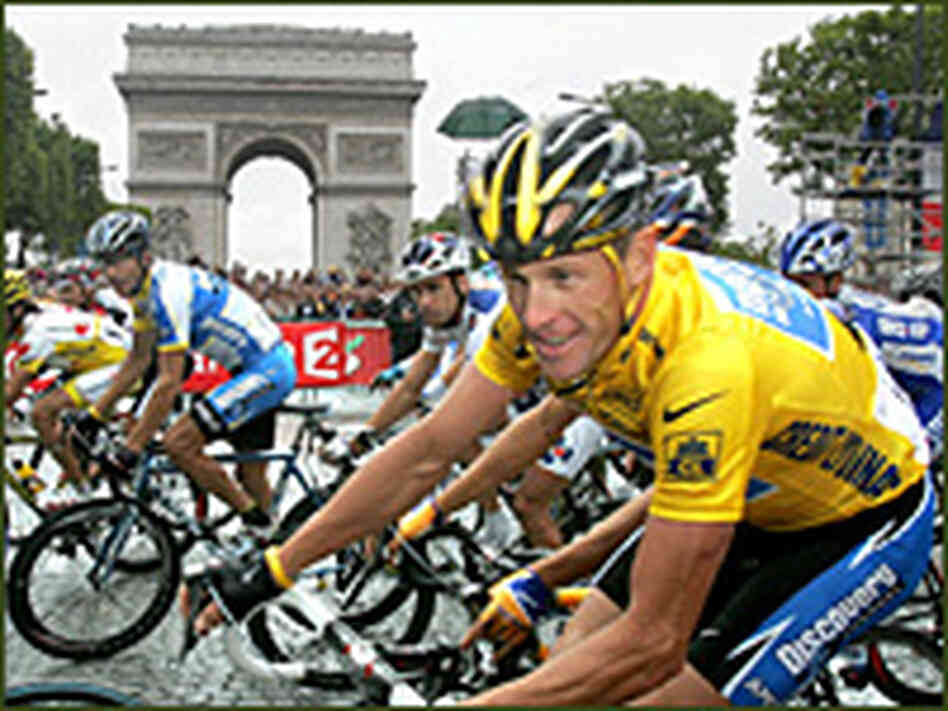 Discovery Channel team rider Lance Armstrong of the U.S. passes the Arc de Triomphe in Paris. Discovery Channel team rider Lance Armstrong of the U.S. passes the Arc de Triomphe in Paris.