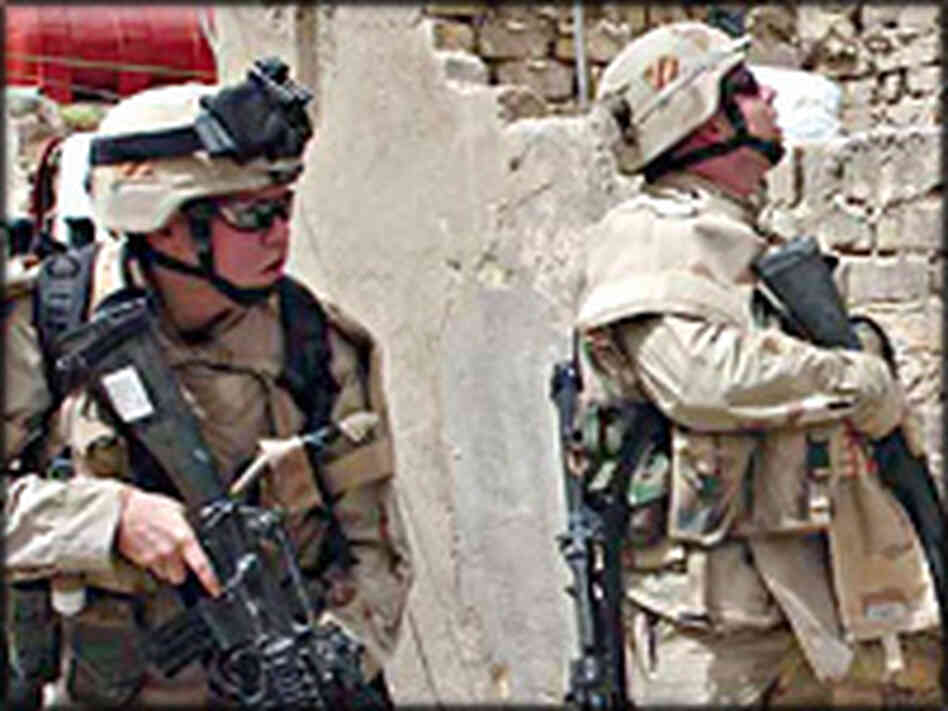 U.S. soldiers from the 3rd Infantry Division prepare to raid a house in central Baghdad. U.S. soldiers from the 3rd Infantry Division prepare to raid a house in central Baghdad.